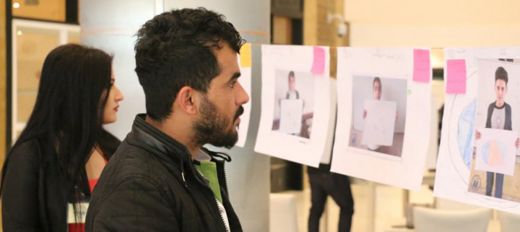 Kirkuk orphans hang their wishes on wall of hope